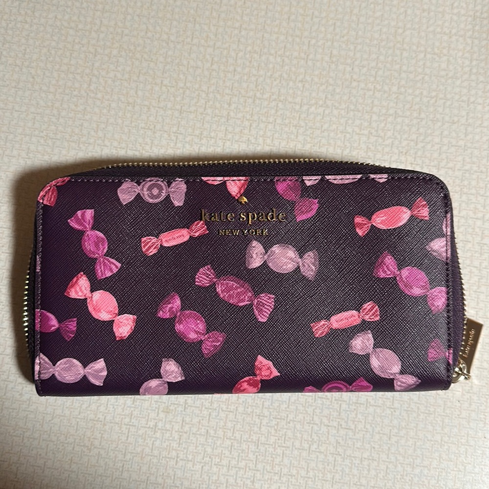 Kate Spade, large wallet, there is a purse on my page that could also match this